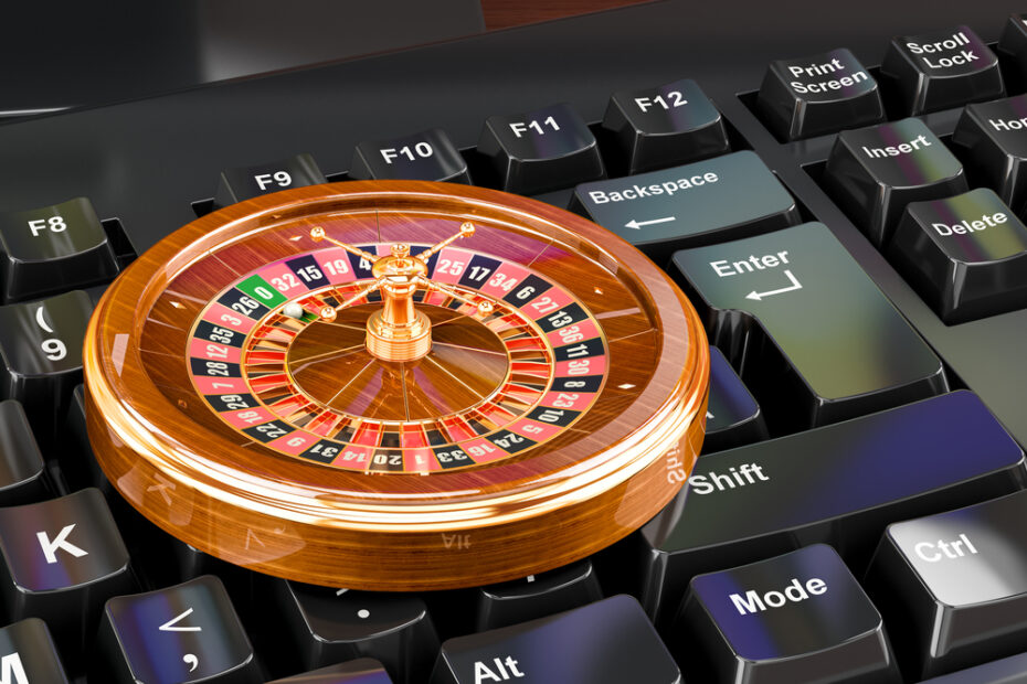 Casino roulette on keyboard button, casino online concept. 3D rendering